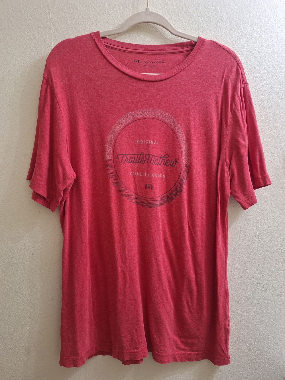 Travis Mathew Short Sleeve Logo Tee in Coral Red